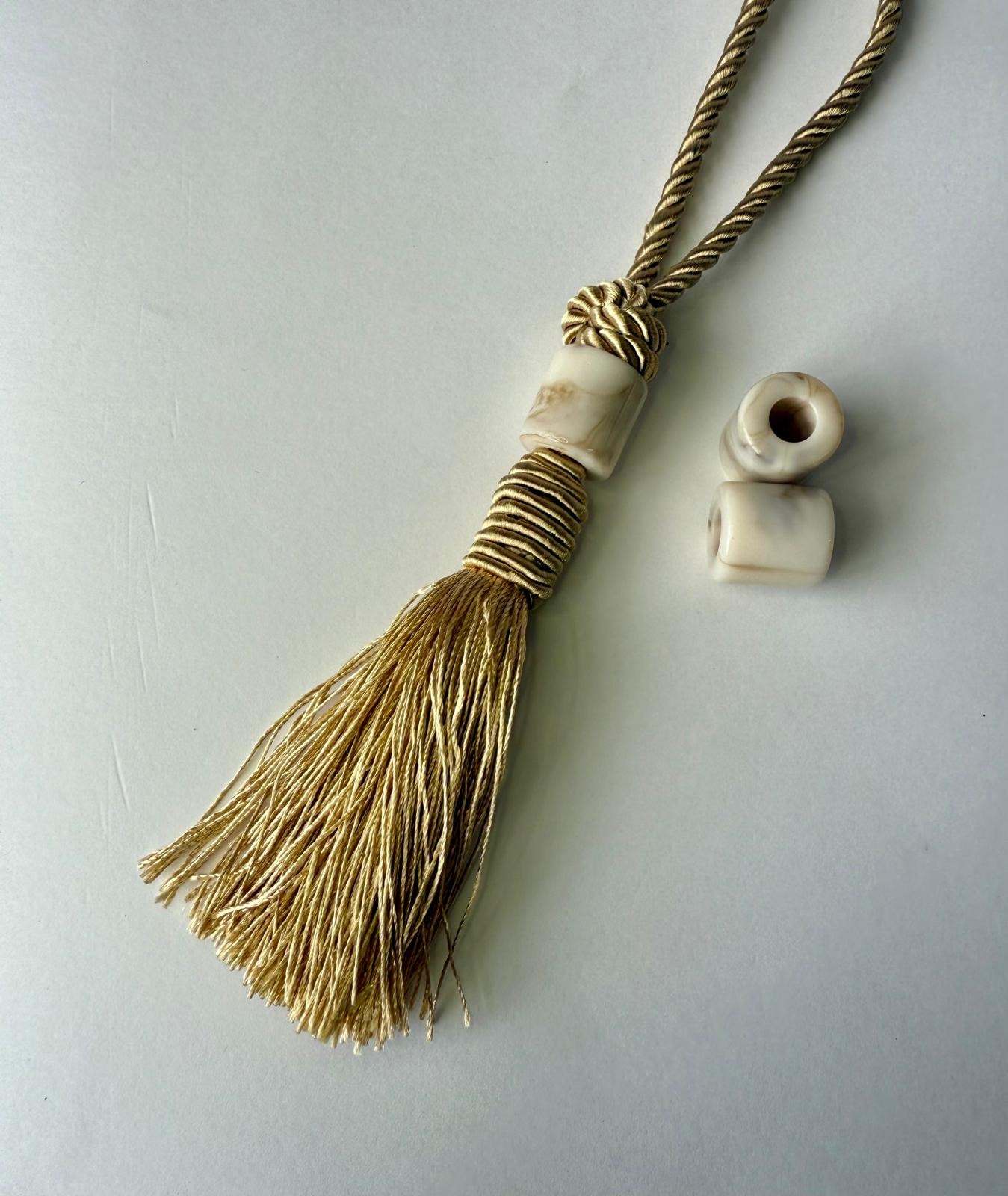 גדיל כותרת+ חרוז דמוי שיש צילינדר - צדף